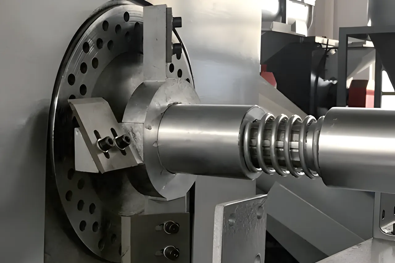 Squeezer cutter head and spring adjustment detail