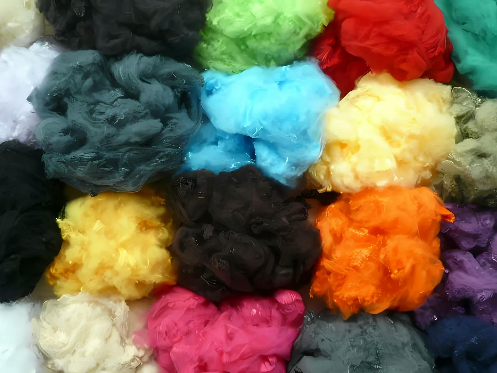 Recycled PET pellets being used to produce polyester staple fiber.