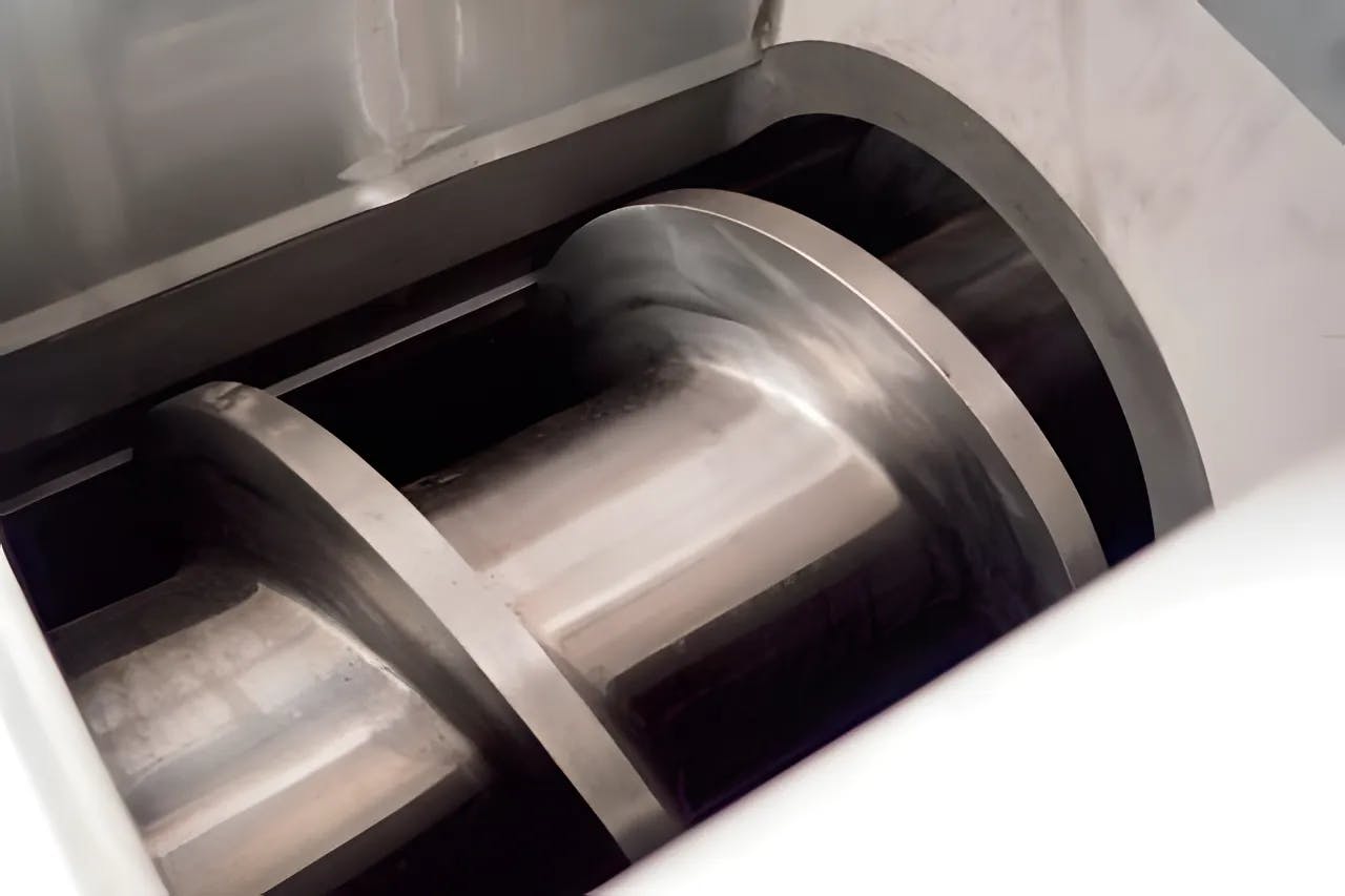 Eine Schnecke für einen Kompressionsverdichter zum Recycling